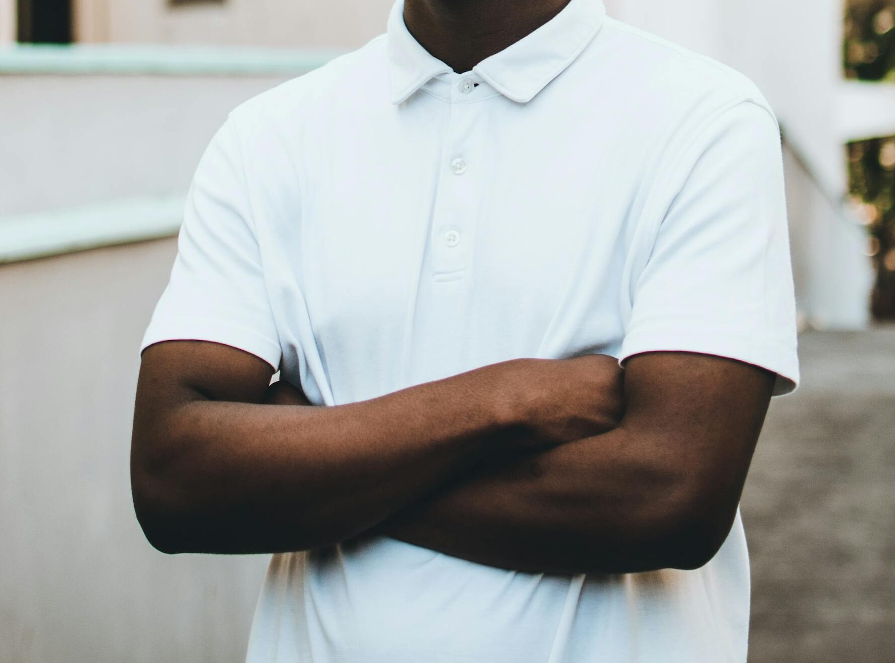 Man Wearing White Polo Shirt